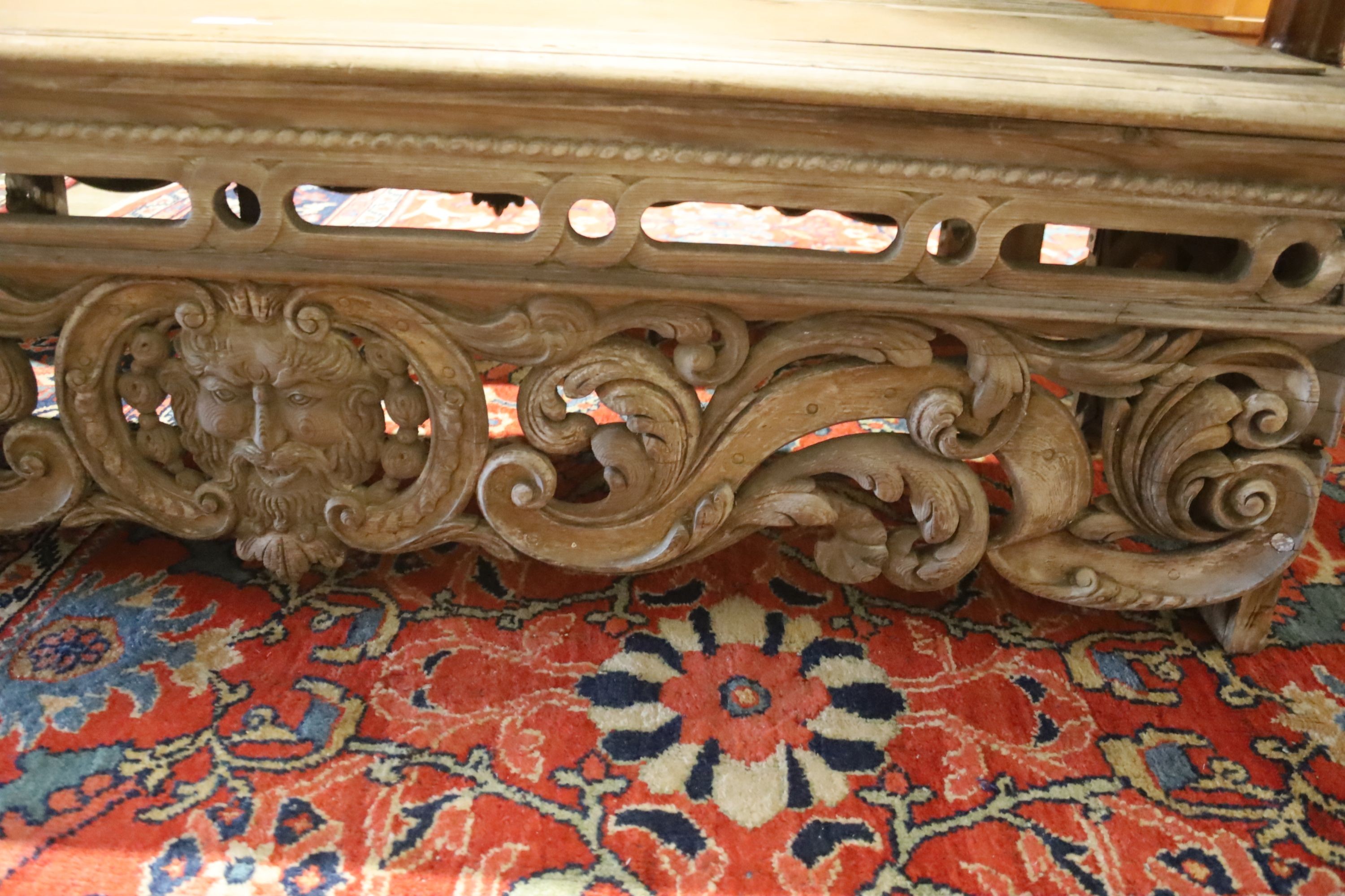 A pair of 19th century carved pine seats, length 142cm, depth 49cm, height 41cm